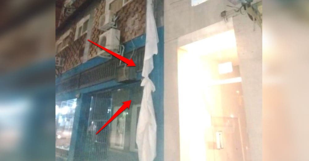 Huye por la ventana del hotel donde permanecía confinado trepando por las sábanas